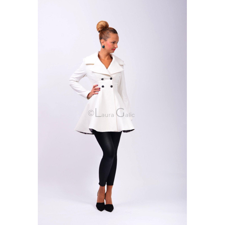 White coat with wide lapels and a double-breasted button front