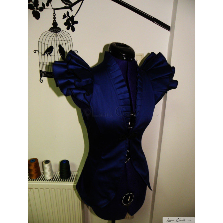 Royal blue Celia jacket with a fitted waist and layered shoulder ruffles