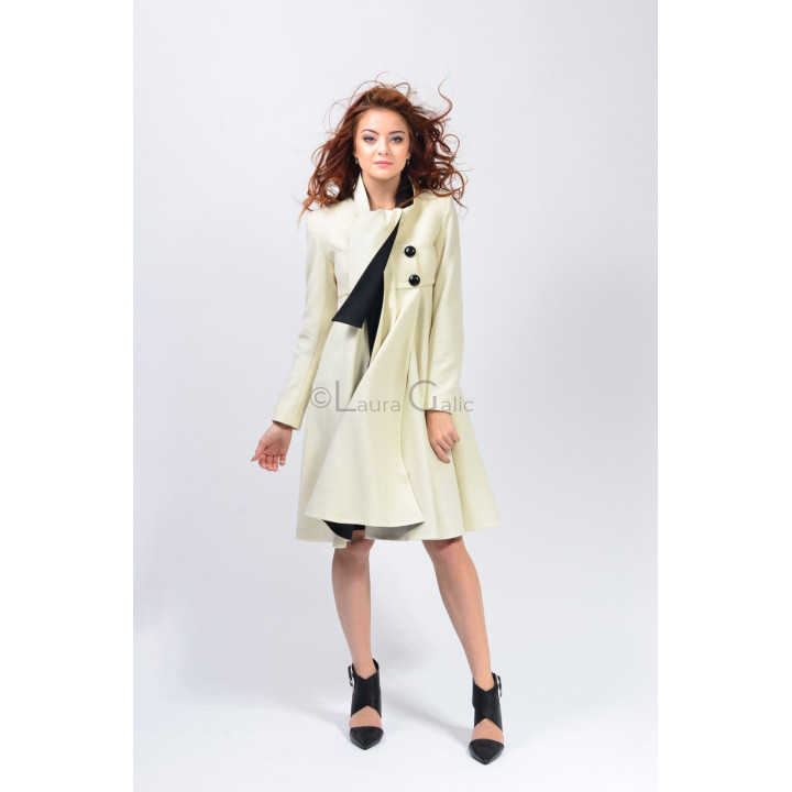 Ivory Greta women's coat with two black buttons and a contrasting diagonal front detail