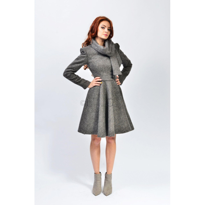Close view of the fitted waist and full skirt on the Beatrice 2 coat
