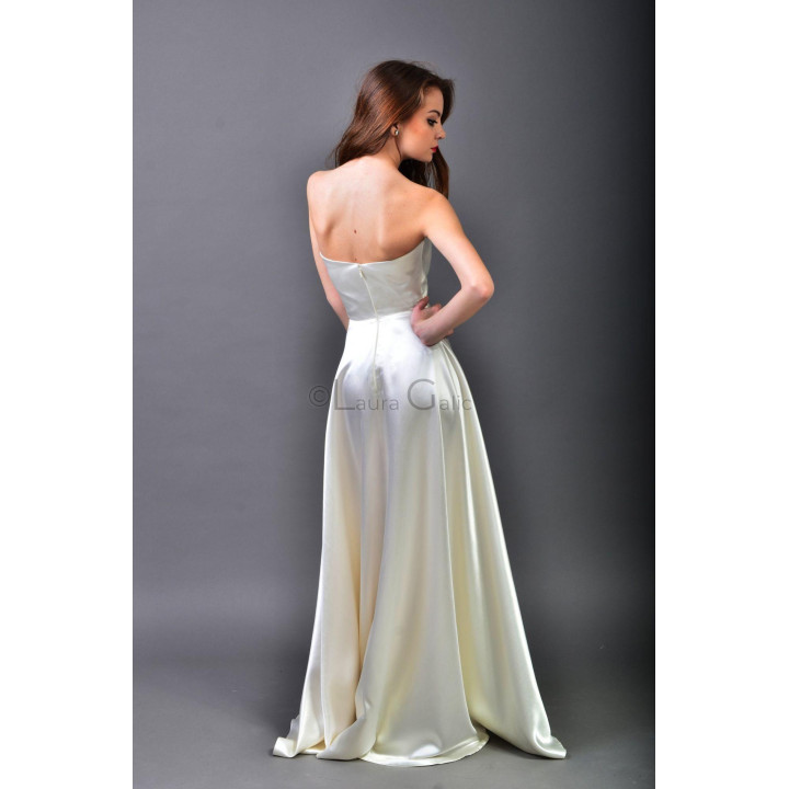 Back of the Alma bridal dress showing the central zipper and long skirt