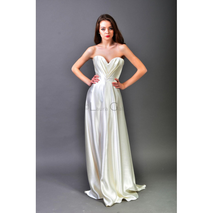 Alma dress without its detachable stone embellishment, showing the pleated corset