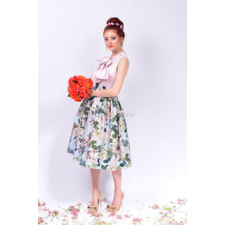 Letitia sleeveless shirt in pale pink with a large bow at the neckline