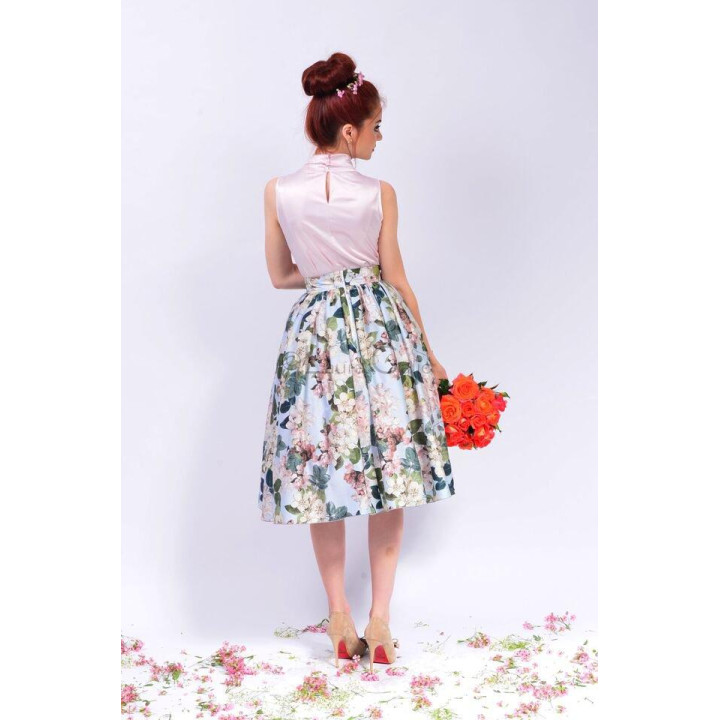 Back of the pale pink Letitia shirt showing a small opening below the collar