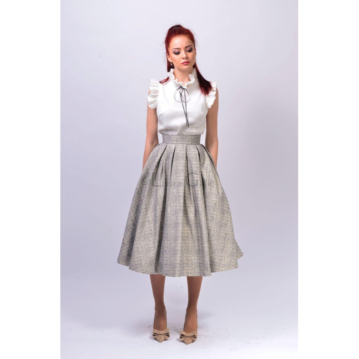 Front view of the Marisa 2 midi skirt with a wide waistband and voluminous pleats