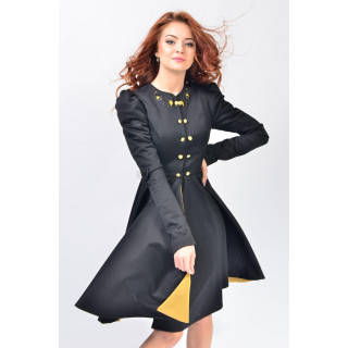 Black Lorelei coat with a full skirt, yellow lining and gold buttons