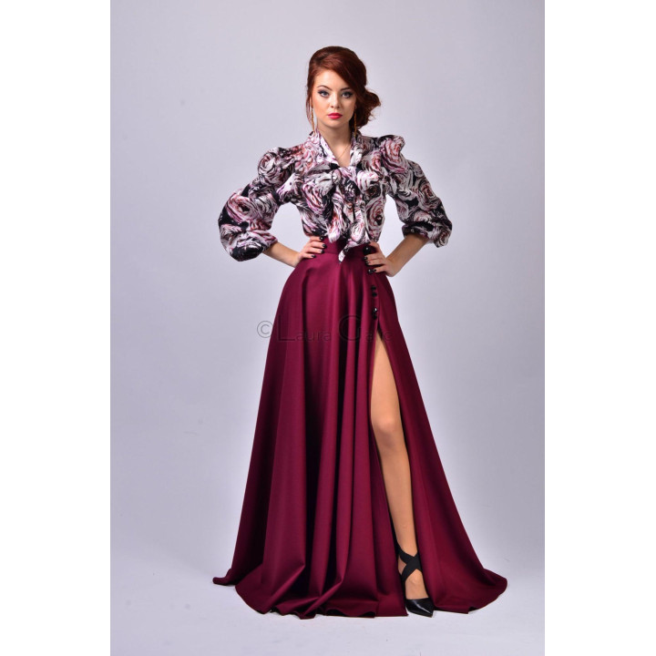 Burgundy Cezara 3 long skirt with front buttons and a slit, styled with a floral blouse
