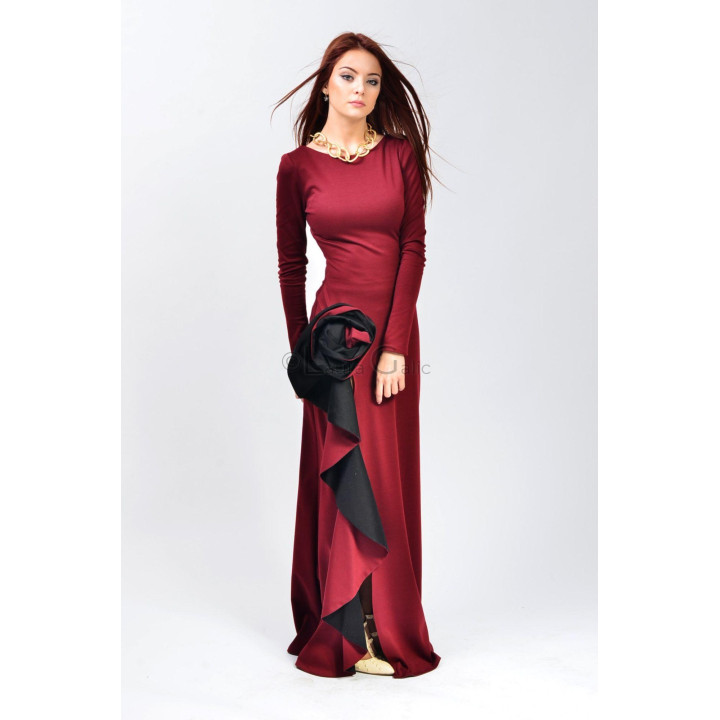 Tereza 3 dress with a flowing burgundy and black ruffle along the slit