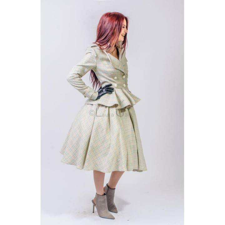 Side view of the Virginia checked jacket showing its defined waist and flared peplum