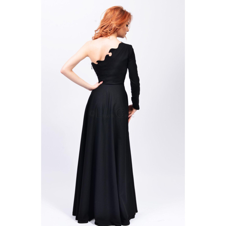 Back view of the Alanis 2 black dress with an asymmetric neckline and full-length skirt