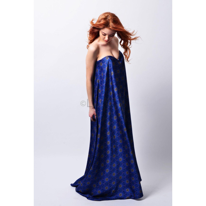 Side view of the Larisa maxi dress with an all-over blue floral ornamental print