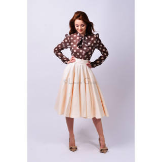 Adina ivory midi skirt with a high waist and full flared shape