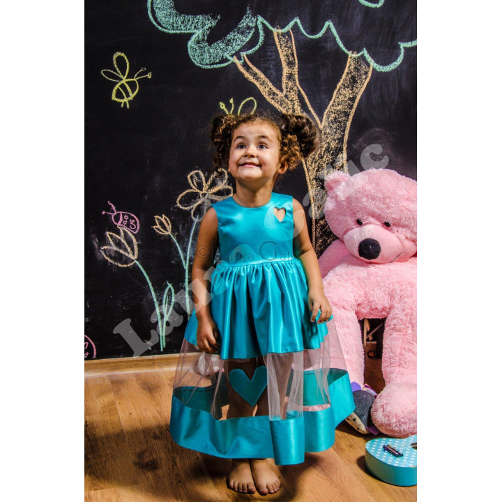Sleeveless bodice and flared tulle skirt of the Mini Julia Dress