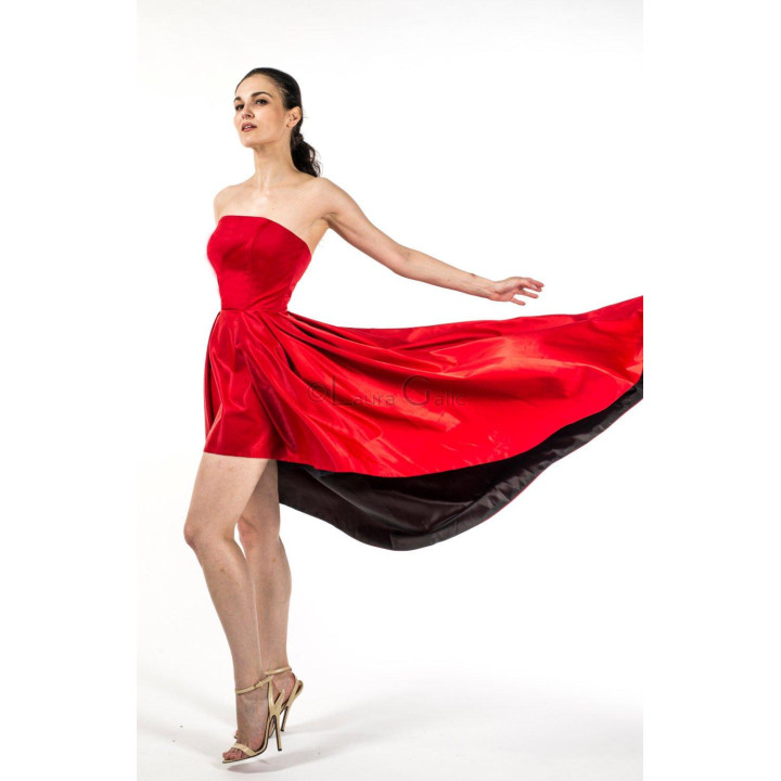 Lorena dress skirt in motion with red outer fabric and a black underlayer