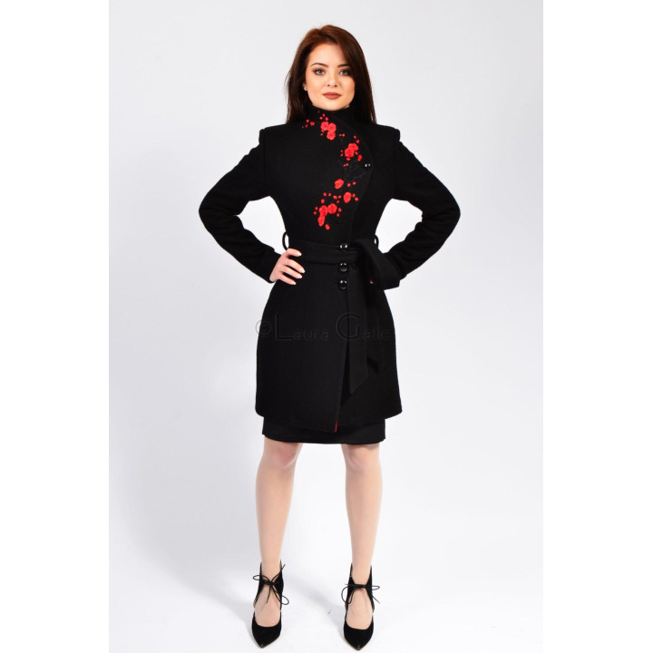 Front view of the Luca 2 women’s coat with a high collar and red floral detail