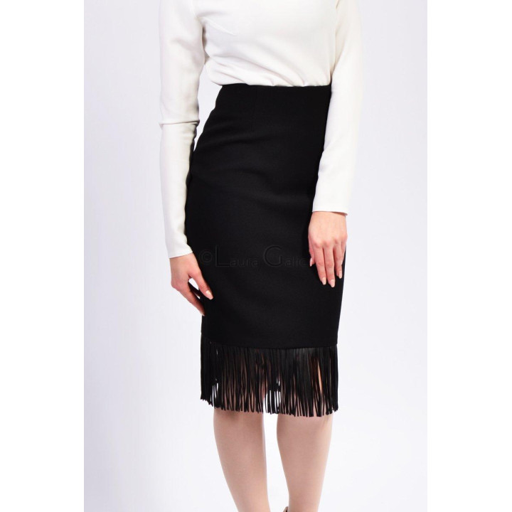 Close-up of the black Mara skirt and its fringed hem