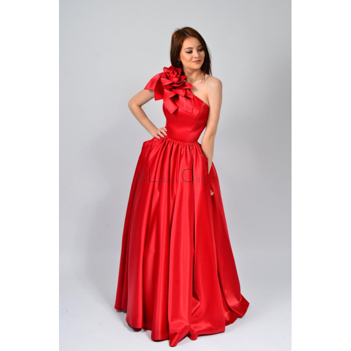 Close view of the floral shoulder detail and gathered full skirt on the red Eleonora 2 dress