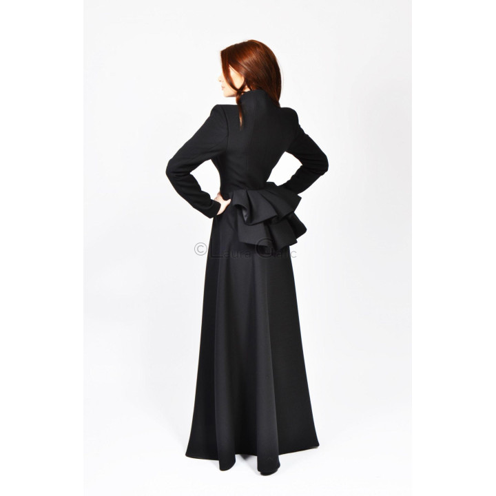 Back view of the black Ligia coat showing its layered waist detail