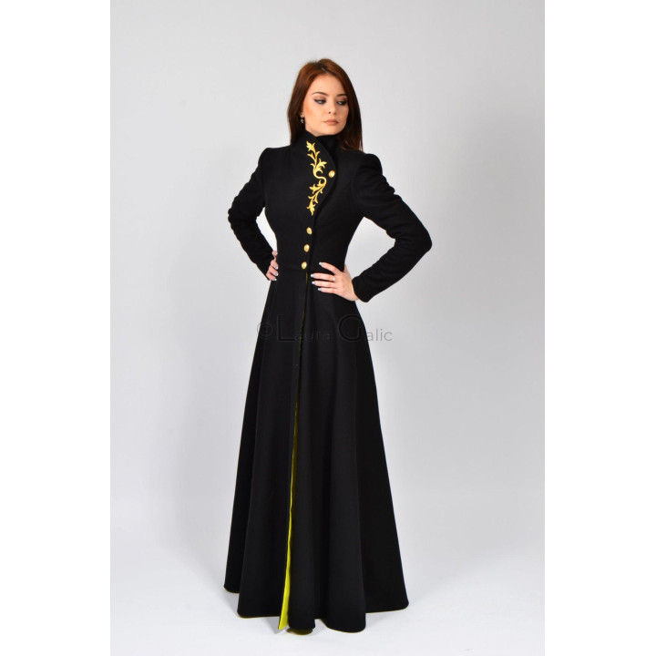 Black Tamura coat with gold floral embroidery, decorative buttons and a full skirt