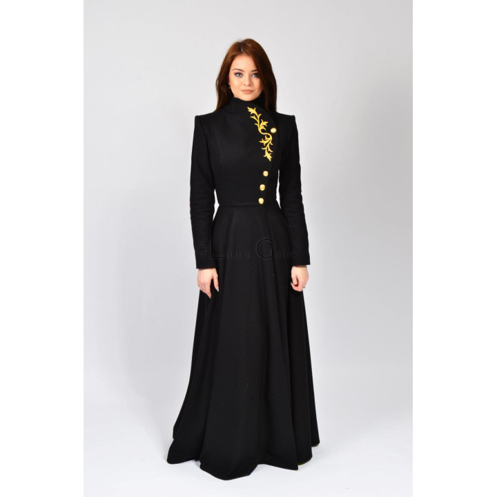 Front view of the Tamura coat showing its high collar and gold chest embroidery