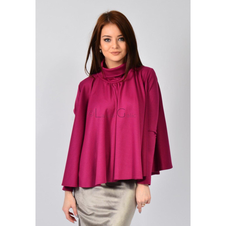 Front view of the Julieta blouse with a folded collar and wide panels