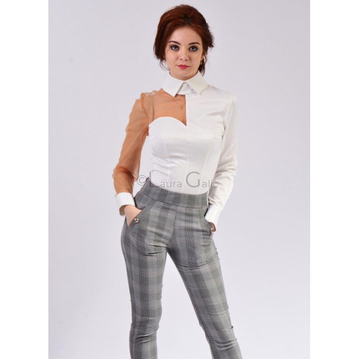 Front detail of grey check trousers showing the wide waistband and angled pockets