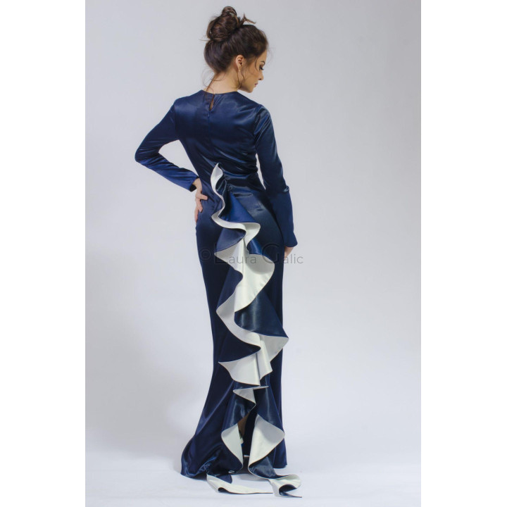The Serena dress from behind, showing its two-tone ruffle down to the hem
