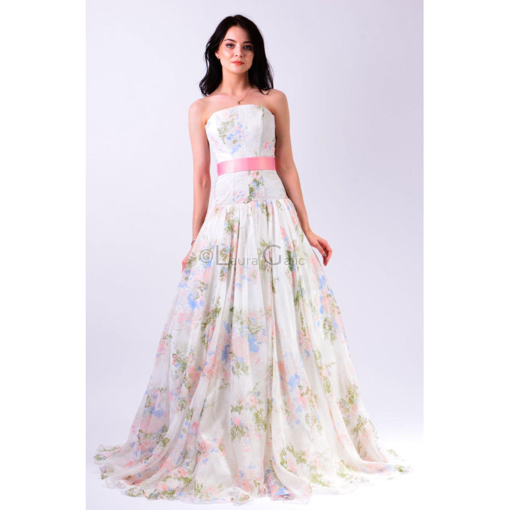 Elisabeta dress showing its straight strapless neckline and pastel floral print