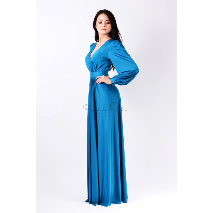 Close view of the Antonia 2 dress's voluminous sleeve and defined waistband