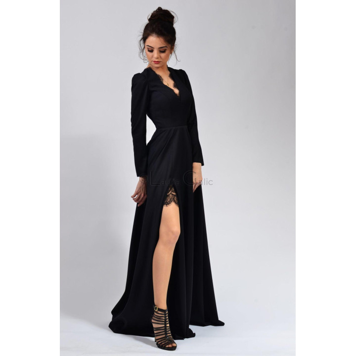 Front view of the Adelina black gown with long sleeves and a full skirt