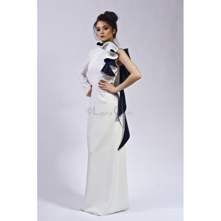 Gloria wedding dress with one long sleeve and layered white and navy shoulder ruffles