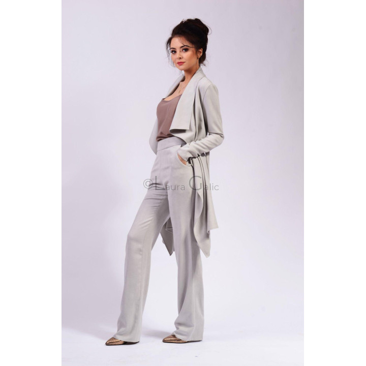 Demetra open-front cardigan showing its long asymmetric draped panels
