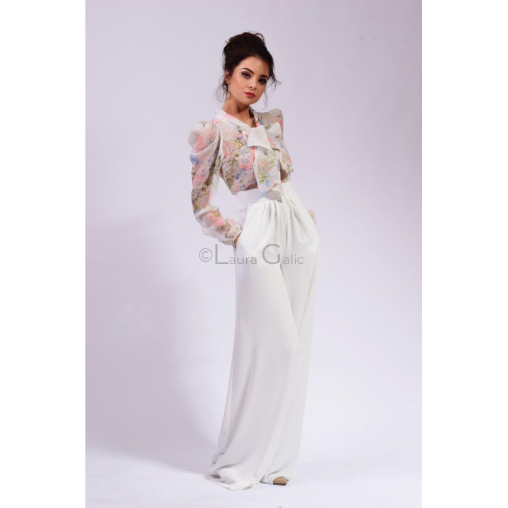 Front view of the Lucretia floral blouse with a bow neckline