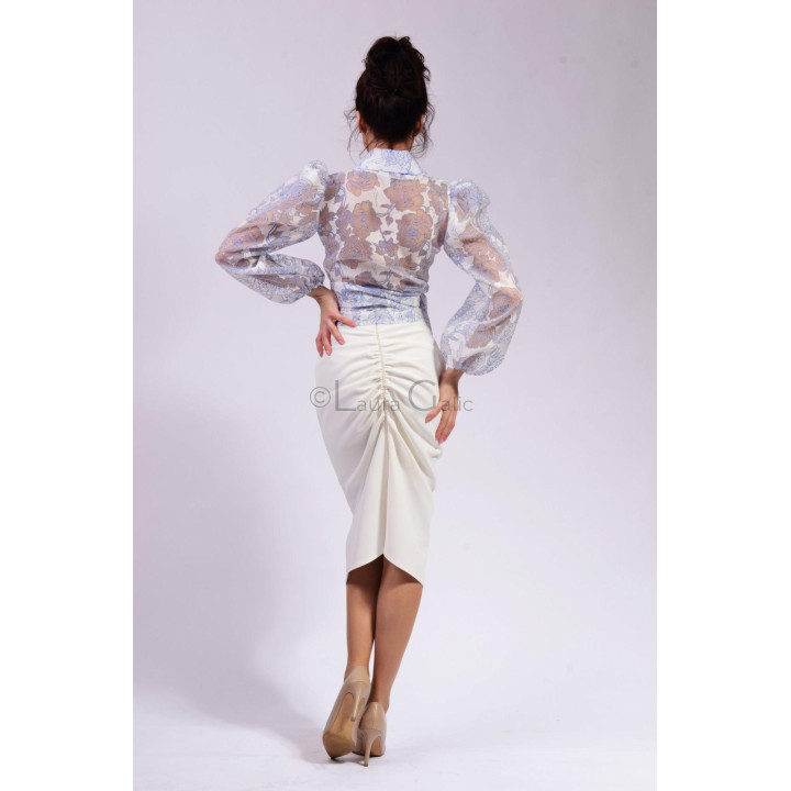 Olive blouse from the back with a notched collar and blue and beige floral print