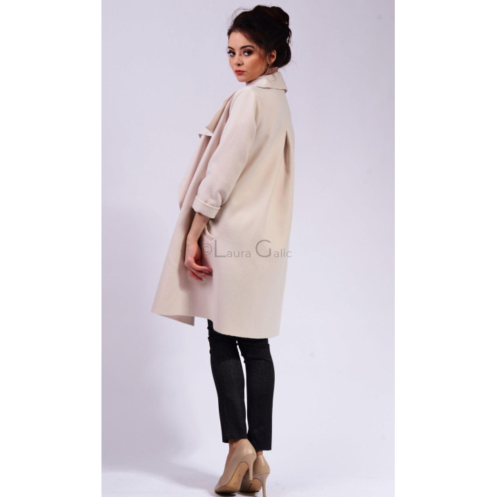 Side and back view of the ivory Demetra cardigan with a longline cut