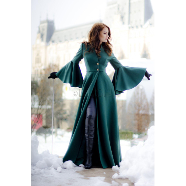 Front view of the Ligia 2 coat with extended flared sleeves and button fastening