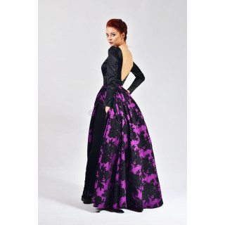 Back view of the Brigitte 2 dress with its open back and full violet skirt with black floral pattern
