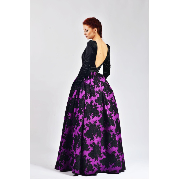 Rear view of the Brigitte 2 dress with a low-cut black bodice and full-length skirt