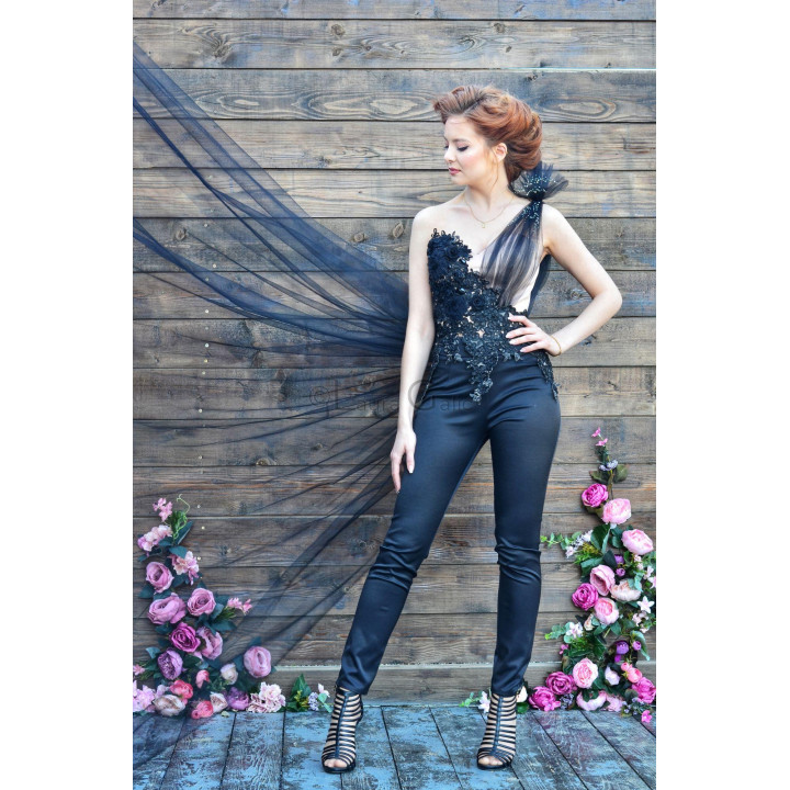 Evolette lace corset styled with a long tulle train