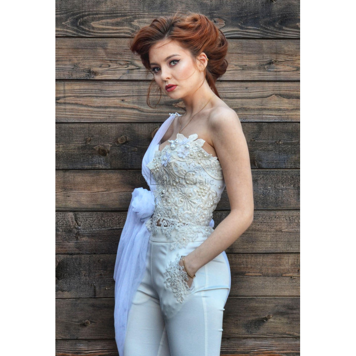 Fitted Kalianna corset with embellished lace and a tulle train gathered at the side
