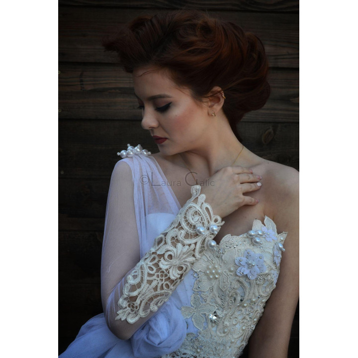 Kalianna corset detail showing the sheer tulle sleeve, floral lace appliqués and pearl embellishments