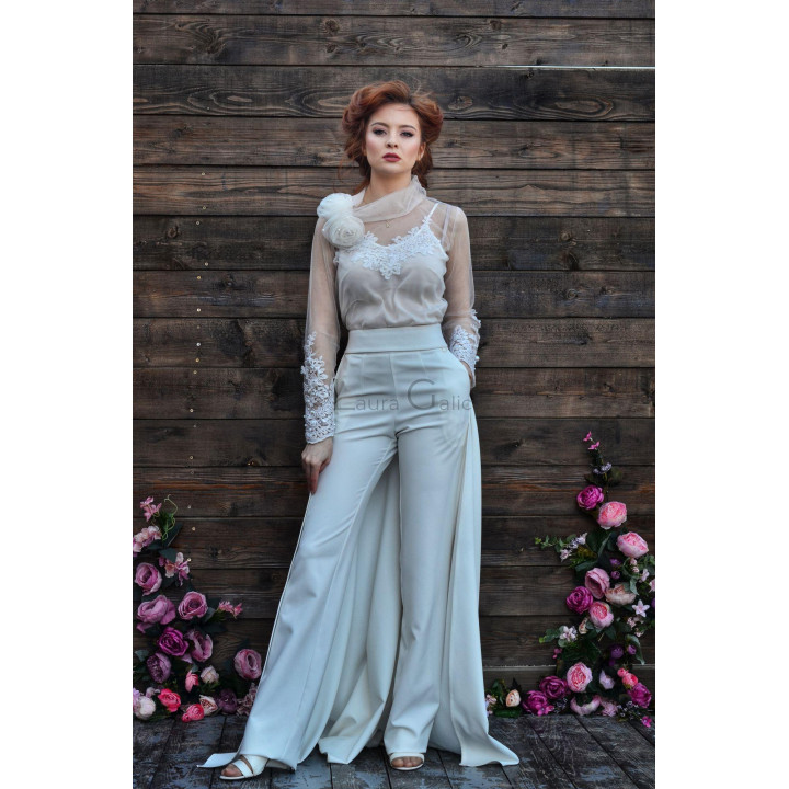 Donatela white blouse with a floral lace appliqué across the front