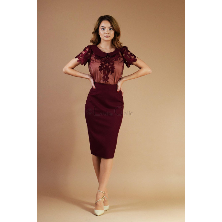 Front detail of the Diana blouse with rounded collar and floral burgundy lace appliqués