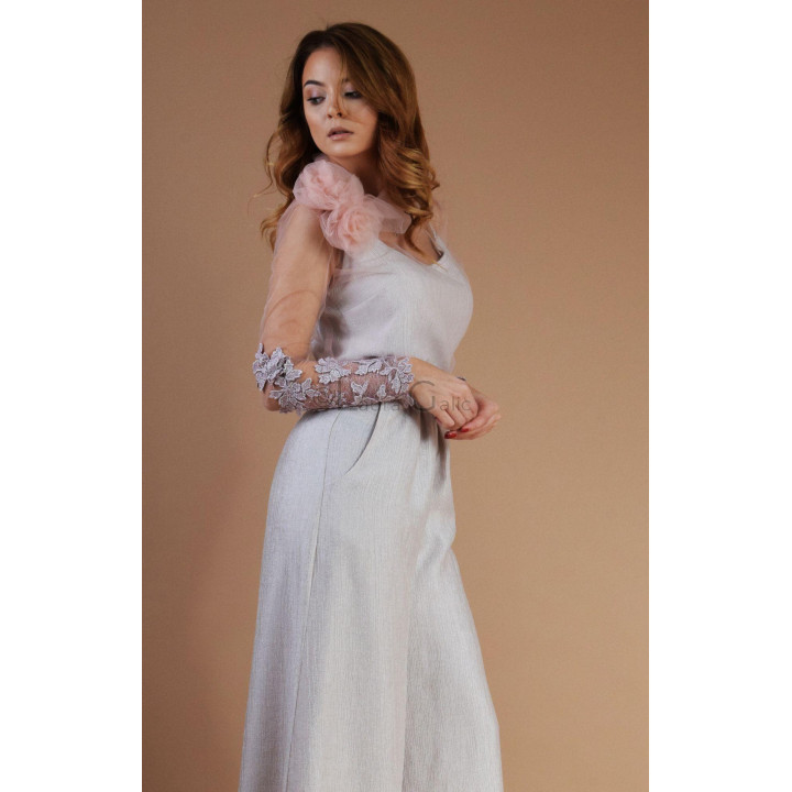 Close-up of the Donatela blouse’s sheer sleeve with floral appliqués and John2 trousers