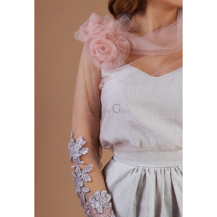 Close-up of the Donatela blouse’s shoulder flower and sheer sleeve with floral appliqués