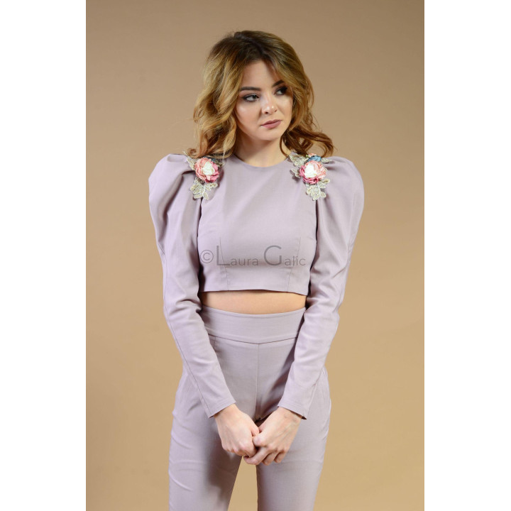 Medeea crop top with a round neckline, voluminous sleeves and floral shoulder details