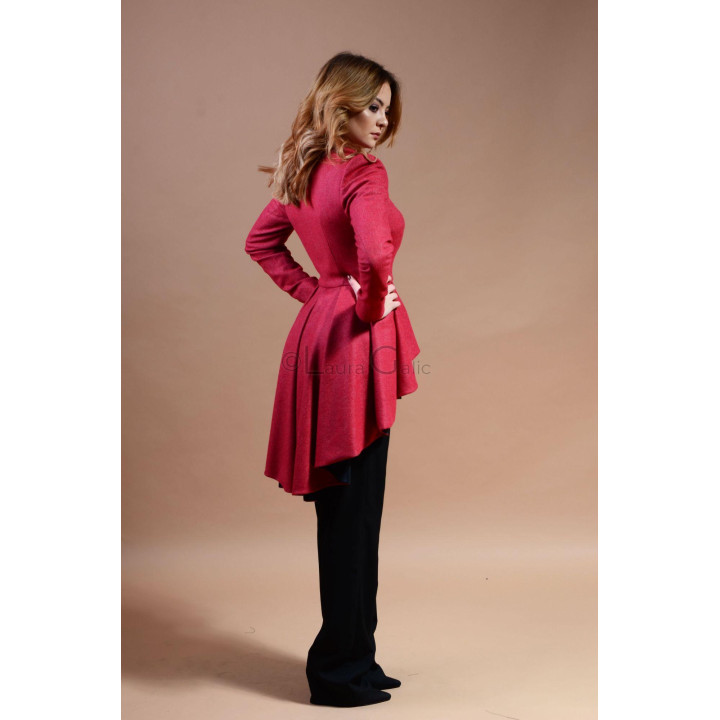 Back view of the Stefania coat showing its pleated peplum and longer hem