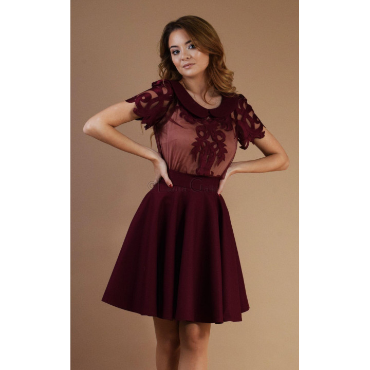 Gina 2 burgundy skirt with a defined waist and full flared shape