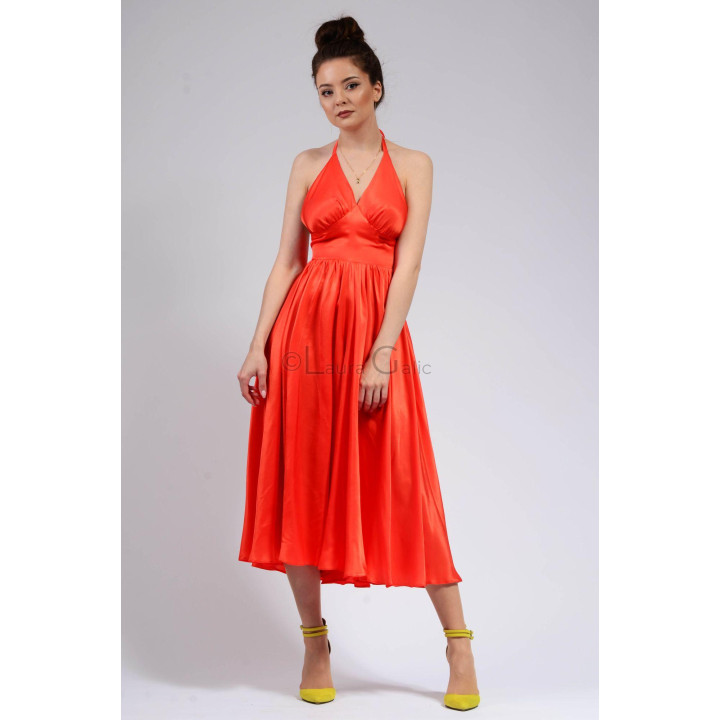 Front detail of the Felicia dress showing its V-neck and defined waist