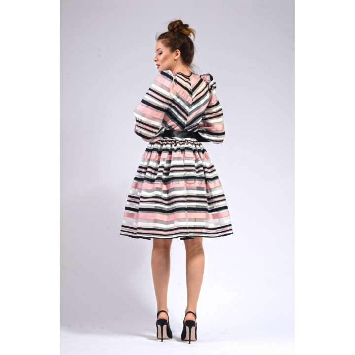 Back view of the striped Viviana dress with a defined waist and full skirt